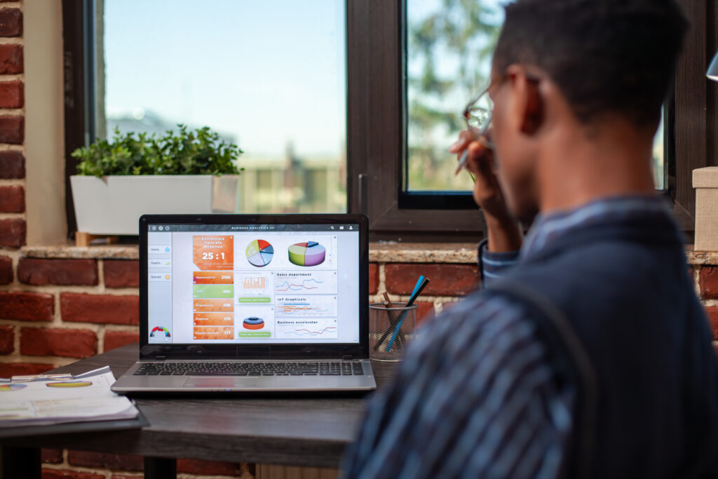 A marketer reviewing campaign analytics on screen