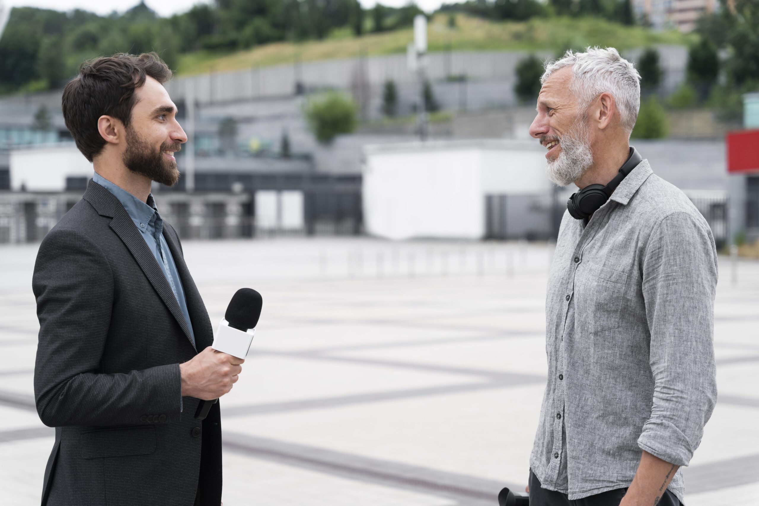 A journalist interviewing a business leader